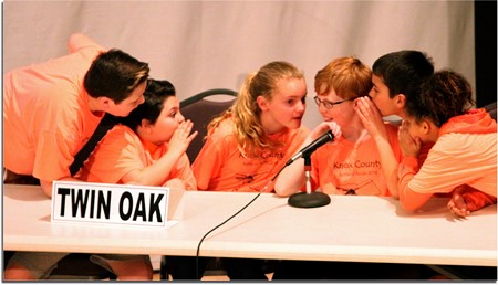 Twin Oak students conferencing during the 2018 Battle of the Books.