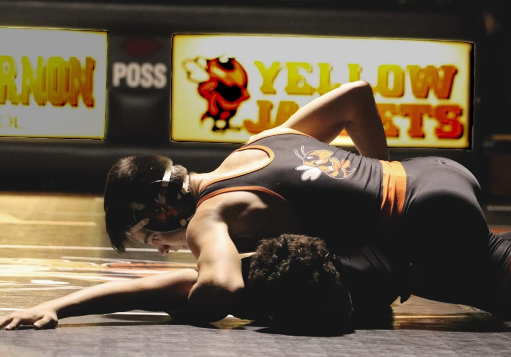 Rylan Firebaugh controlling his opponent during a wrestling match.