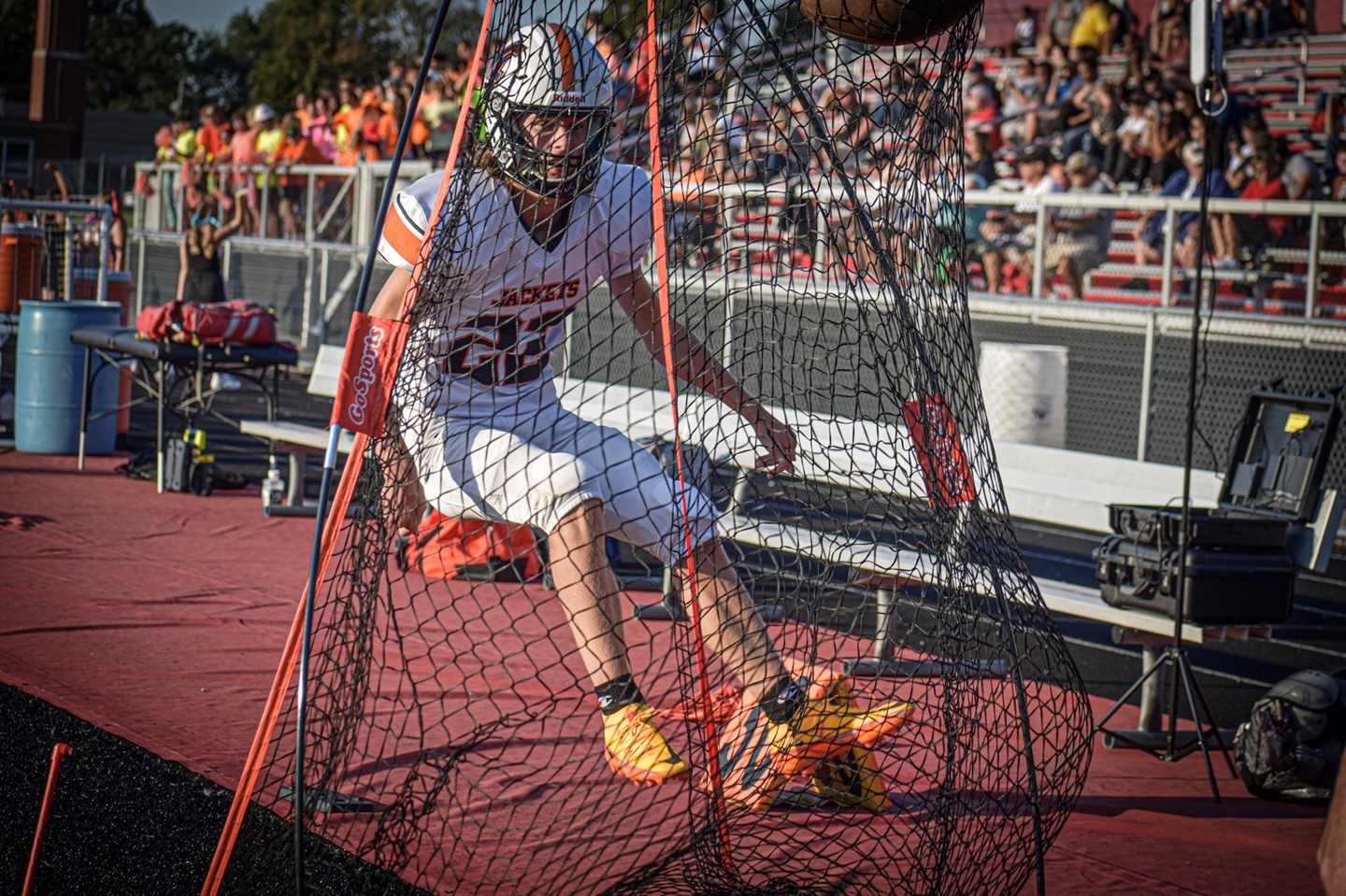 Senior Jack Craigo warms up for an extra point