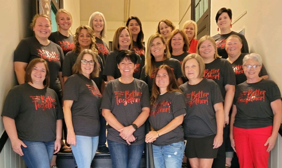 Wiggin Street Staff in front stairwell.