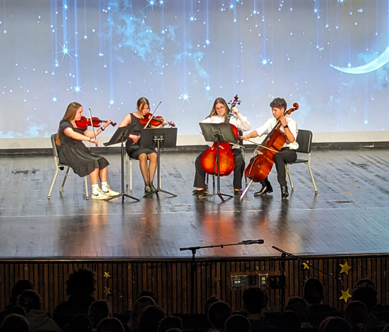 String Quartet performing on stage in the Mount Vernon High School theater.