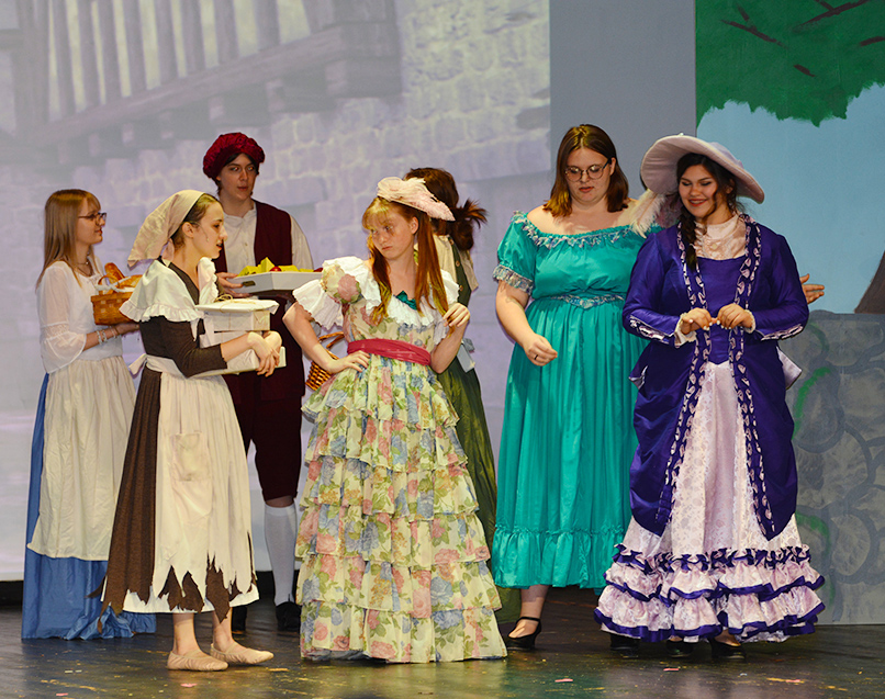 Students performing a scene from Cinderella.