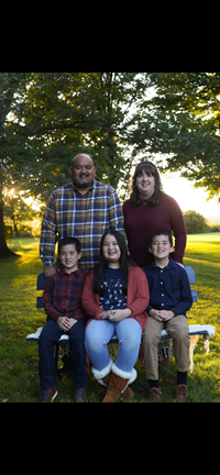 Mrs. Cheng with her husband, Alvin, and her 3 children